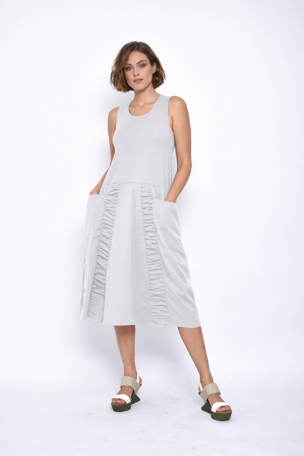 Sleeveless Ophelia Dress by SIMPLY MILA Modern Women's Clothing, featuring a flowing fabric and elegant design.