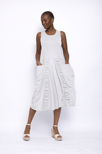 Sleeveless Ophelia Dress by SIMPLY MILA Modern Women's Clothing, featuring a fitted bodice and flowing skirt in soft fabric.