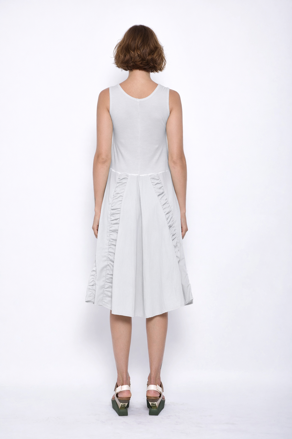 Sleeveless Ophelia Dress by SIMPLY MILA Modern Women's Clothing, featuring a flowing design and elegant neckline.