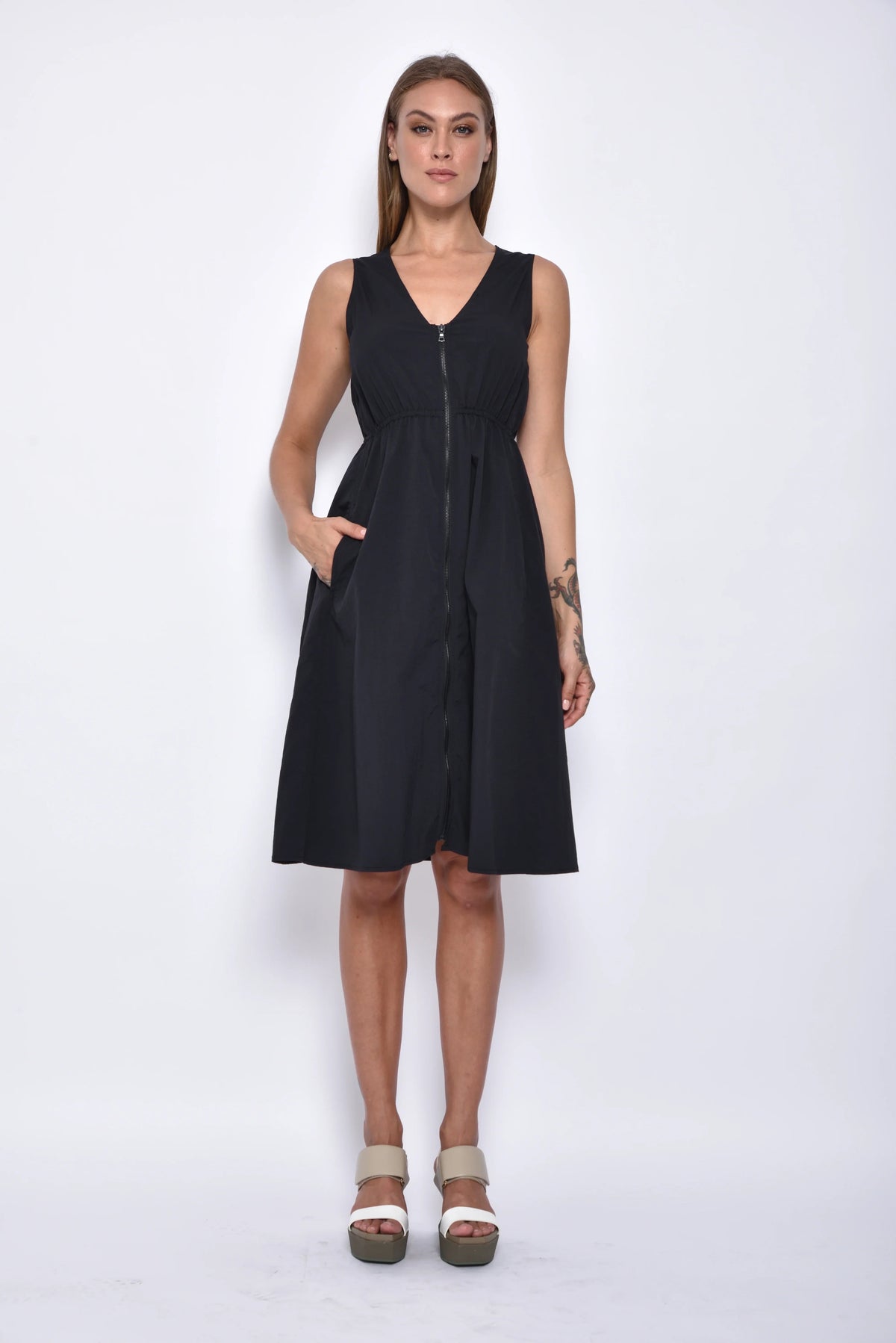 Front view of the Helena Dress by SIMPLY MILA, a stylish women's dress with a fitted bodice and flowy skirt.