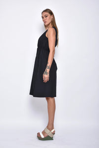 Side view of the Helena Dress by SIMPLY MILA Modern Women's Clothing, showcasing its stylish design and fit.