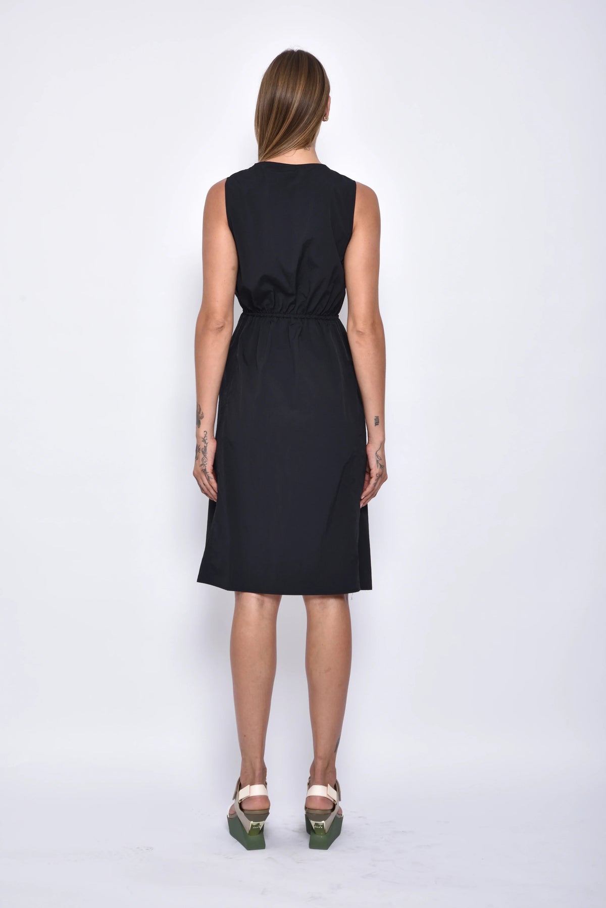 Back view of the Helena dress by SIMPLY MILA, a modern women's dress with a stylish design and comfortable fit.