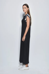 Side view of a stylish Phoebe dress by SIMPLY MILA Modern Women's Clothing, featuring a flowy silhouette and elegant design.