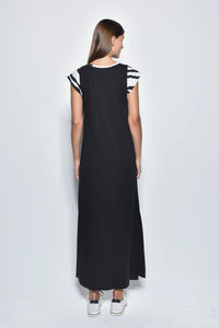 Back view of a stylish Phoebe dress by SIMPLY MILA Modern Women's Clothing, featuring a fitted silhouette and elegant design.