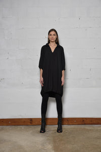 Elegant Poetry Dress from SIMPLY MILA, featuring a flowing design and modern style for women's fashion.