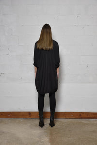 Elegant Poetry Dress by SIMPLY MILA featuring a flowing design, perfect for modern women's fashion.