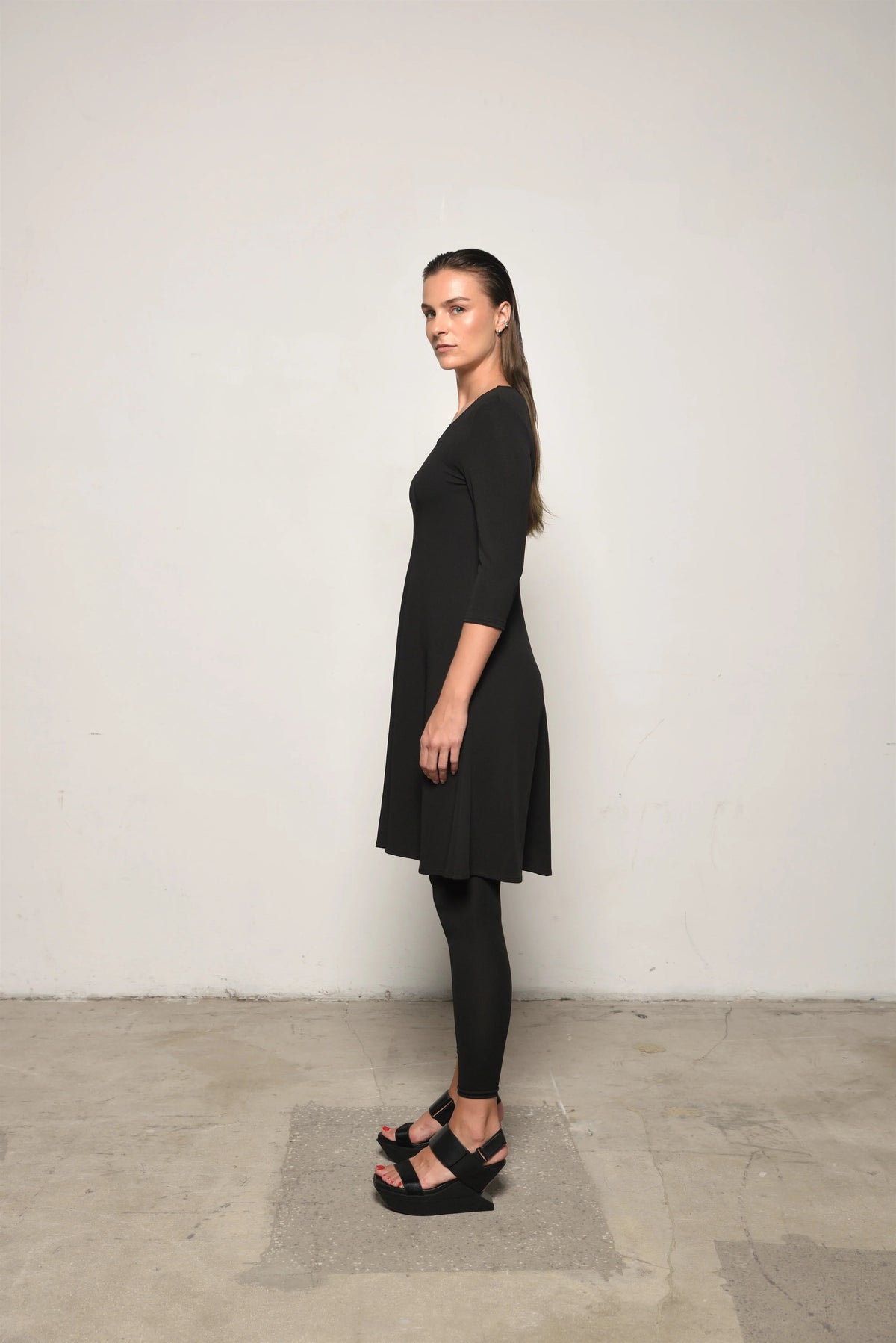 Simply Mila Traveler Dress, a stylish women's dress with a comfortable fit, shown in a natural pose on a plain background.