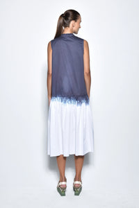 Back view of SIMPLY MILA Ombre Sahara dress showing flowing fabric and stylish design in a modern women's dress.