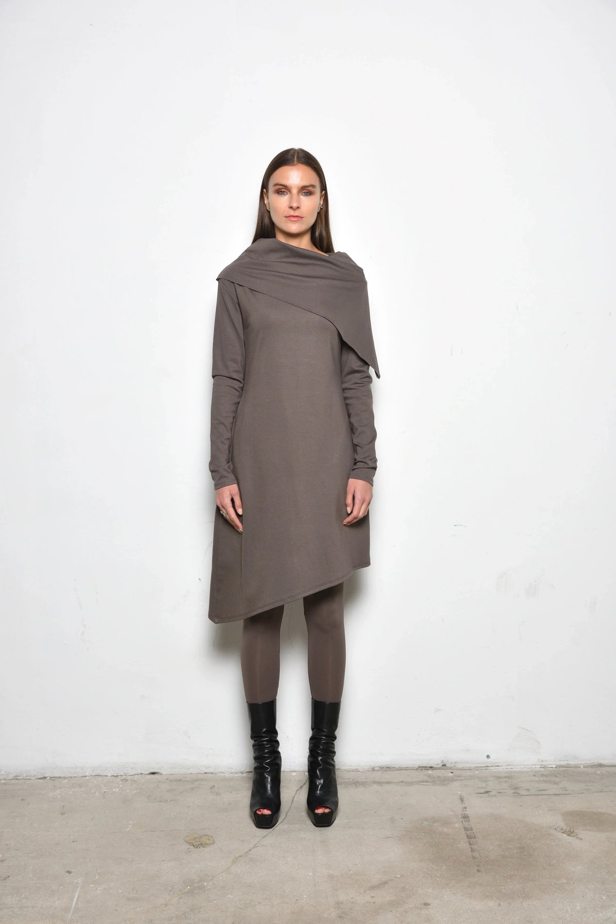Front view of a stylish Amsterdam dress by SIMPLY MILA Modern Women's Clothing, featuring a contemporary design and feminine silhouette.