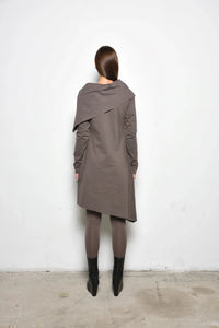 Back view of a stylish Amsterdam dress by SIMPLY MILA Modern Women's Clothing, featuring a flowing design and elegant fabric.