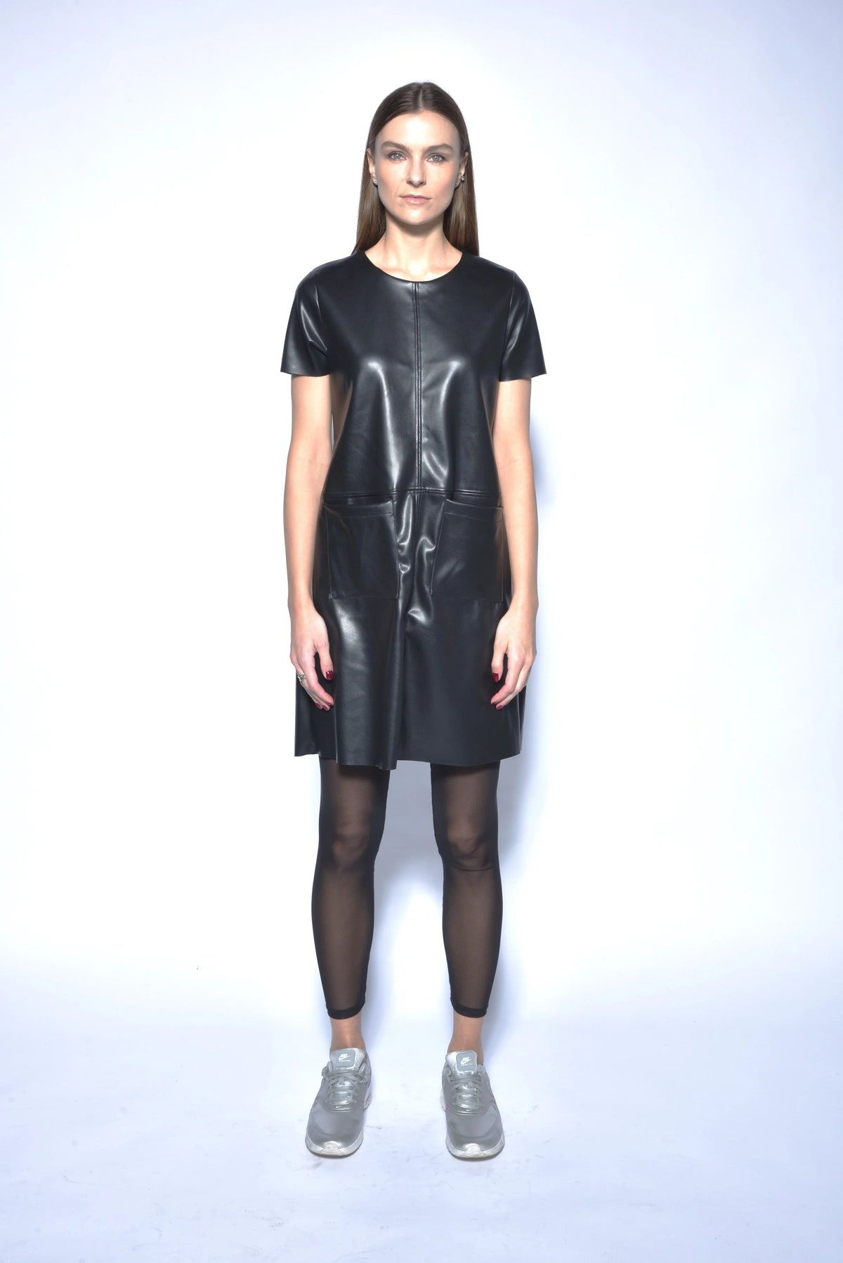 Black Anastasia dress from SIMPLY MILA Modern Women's Clothing, showcasing a stylish, fitted dress with elegant details.