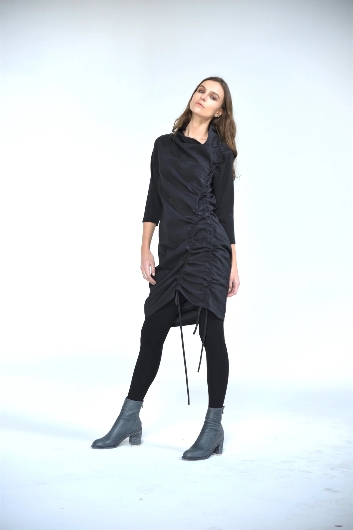 Elegant double ruch dress from SIMPLY MILA Modern Women's Clothing featuring flowing fabric and stylish design.