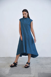 Black Gaia dress from SIMPLY MILA Modern Women's Clothing, featuring a stylish, flowy design with elegant details.