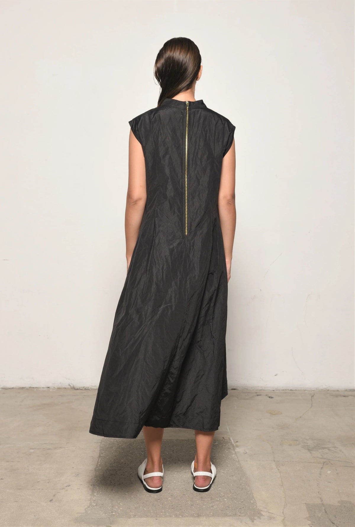 Elegant Gaia dress by SIMPLY MILA Modern Women's Clothing, featuring a flowing silhouette and stylish design for women.