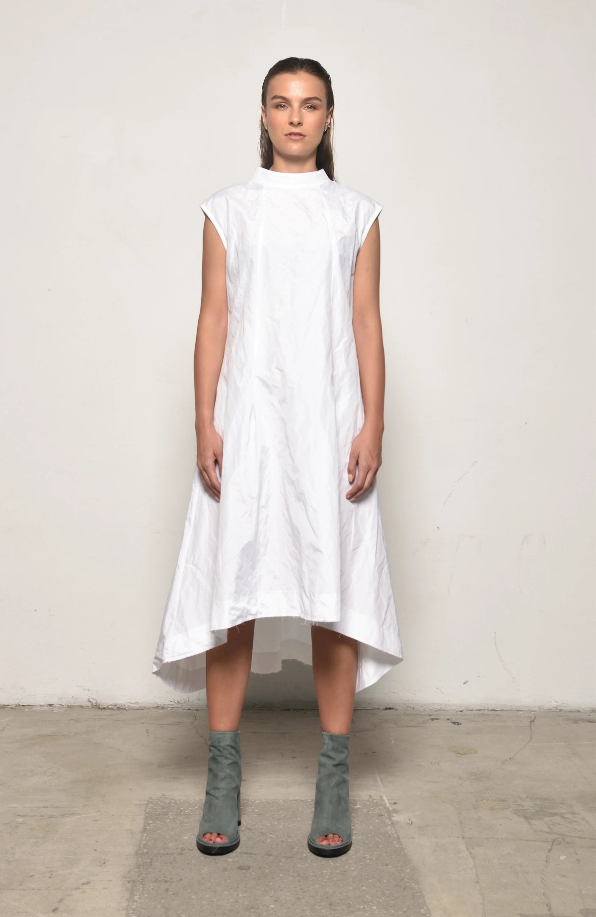 Elegant Gaia dress by SIMPLY MILA Modern Women's Clothing, featuring a flowing fabric and stylish design perfect for casual or semi-formal wear.