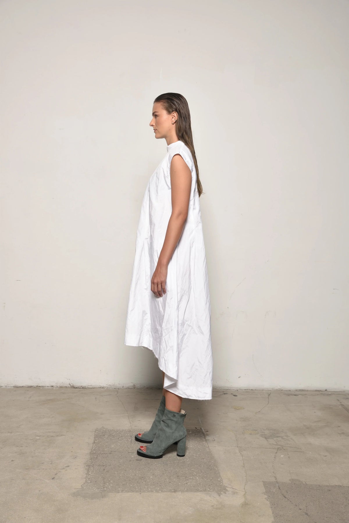 Elegant Gaia dress by SIMPLY MILA Modern Women's Clothing, featuring a flowing design and stylish details.