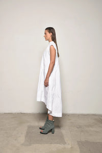 Elegant Gaia dress by SIMPLY MILA Modern Women's Clothing, featuring a flowing design and stylish details.
