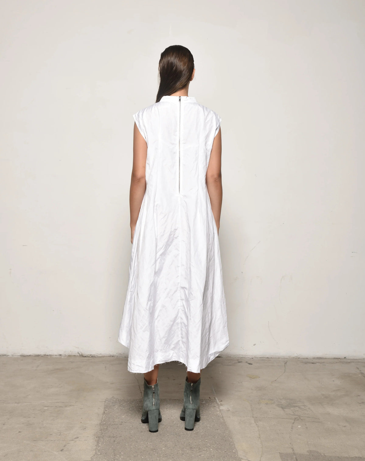 Elegant Gaia dress by SIMPLY MILA Modern Women's Clothing, featuring a flowing fabric and stylish design perfect for casual or formal wear.