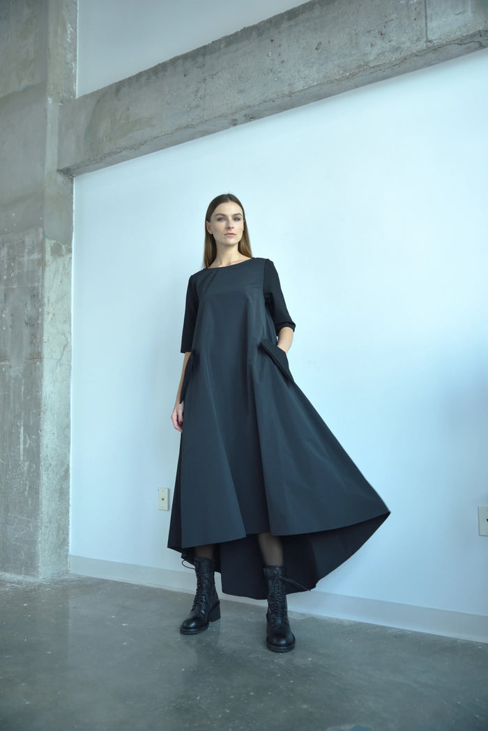 Elegant high-low gown from SIMPLY MILA Modern Women's Clothing, flowing fabric and stylish design perfect for formal occasions.