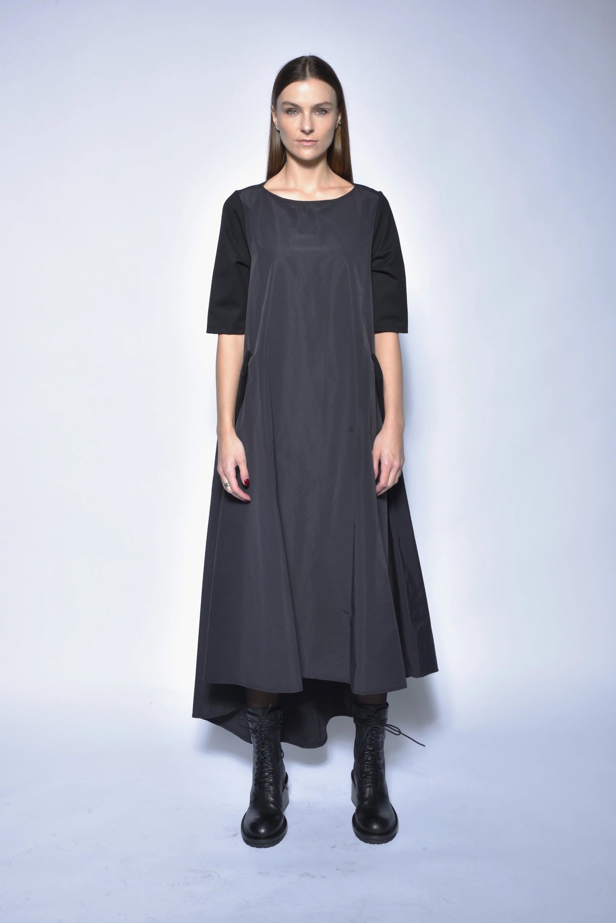 Elegant high-low gown from SIMPLY MILA Modern Women's Clothing, flowing dress with a stylish hemline in soft fabric.