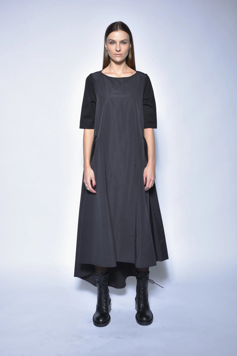 Elegant high-low gown from SIMPLY MILA Modern Women's Clothing, flowing dress with a stylish hemline in soft fabric.