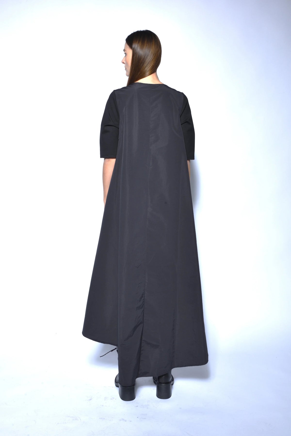 Elegant high-low gown from SIMPLY MILA Modern Women's Clothing, flowing dress with a fitted bodice and layered skirt.