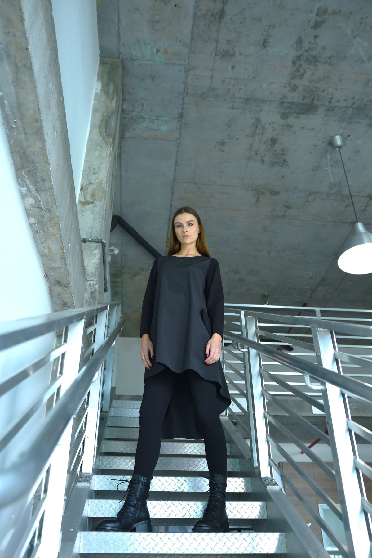 Light blue high-low tunic dress by SIMPLY MILA, featuring a flowy silhouette and casual style perfect for modern women's fashion.