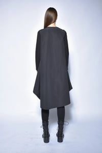 High-low tunic dress by SIMPLY MILA, featuring a flowy design with long sleeves and a relaxed fit, perfect for modern women's fashion.
