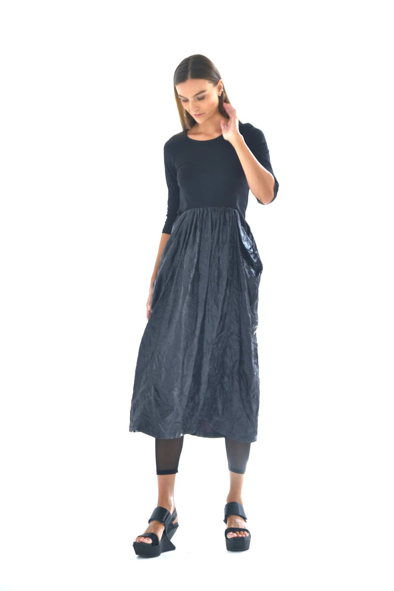 Hydra dress by SIMPLY MILA Modern Women's Clothing, stylish sleeveless dress with a flowing fit and vibrant color for casual wear.
