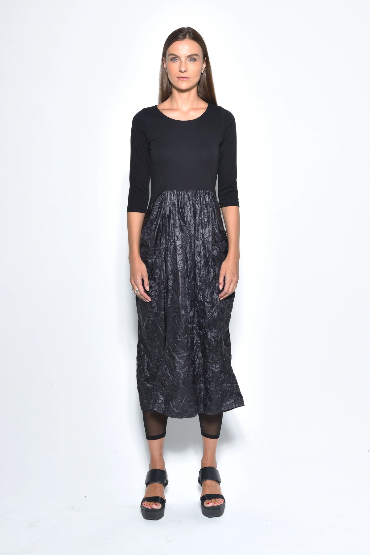 Front view of the Hydra dress by SIMPLY MILA Modern Women's Clothing, featuring a stylish, flowy dress design.