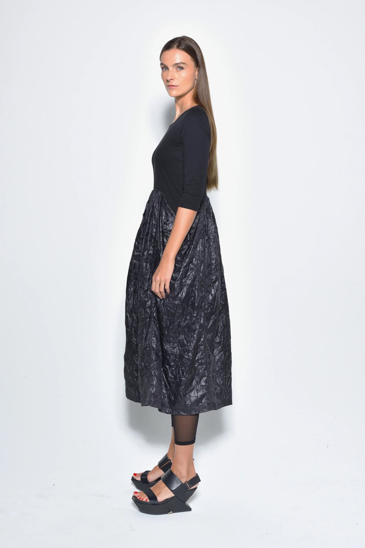 Side view of the Hydra dress by SIMPLY MILA, a modern women's dress featuring a stylish and comfortable design.