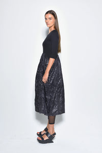 Side view of the Hydra dress by SIMPLY MILA, a modern women's dress featuring a stylish and comfortable design.