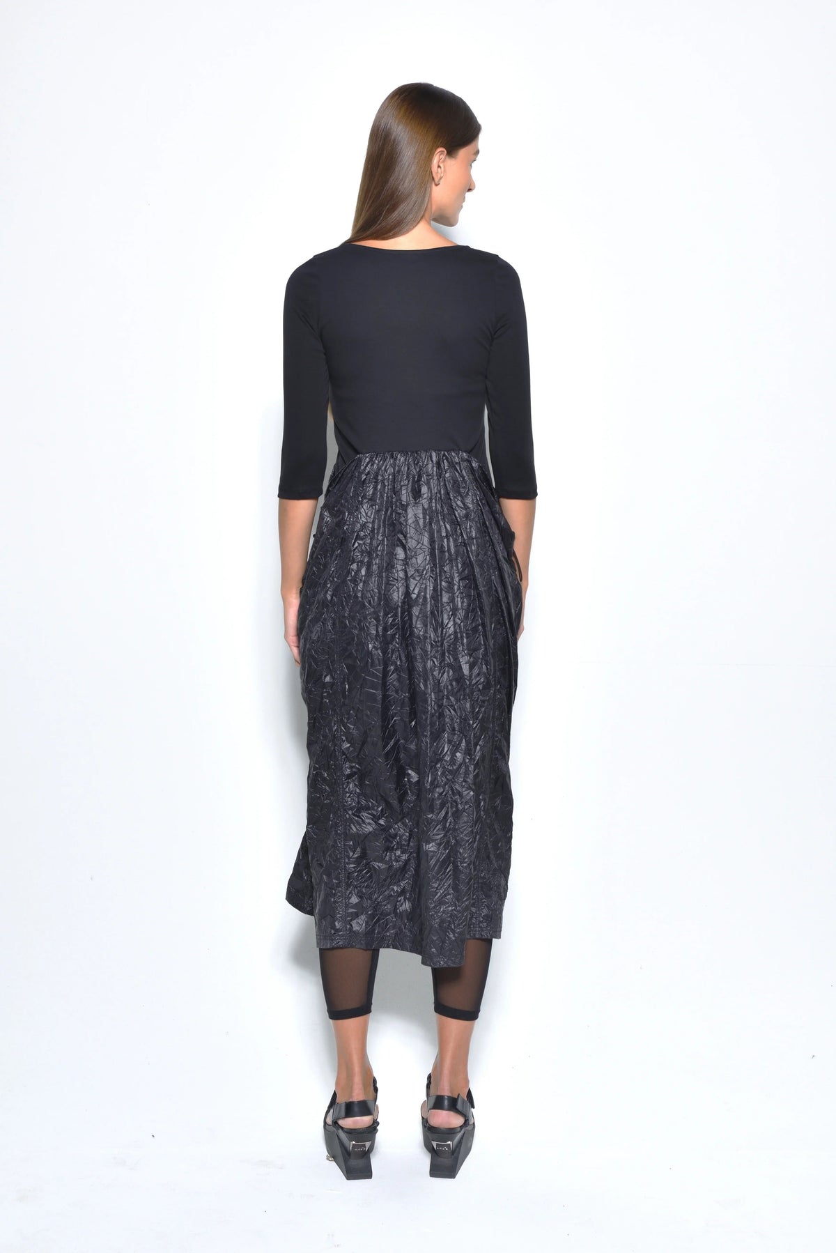 Back view of a Hydra dress by SIMPLY MILA, a modern women's dress featuring a stylish and elegant design.
