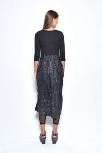 Back view of a Hydra dress by SIMPLY MILA, a modern women's dress featuring a stylish and elegant design.