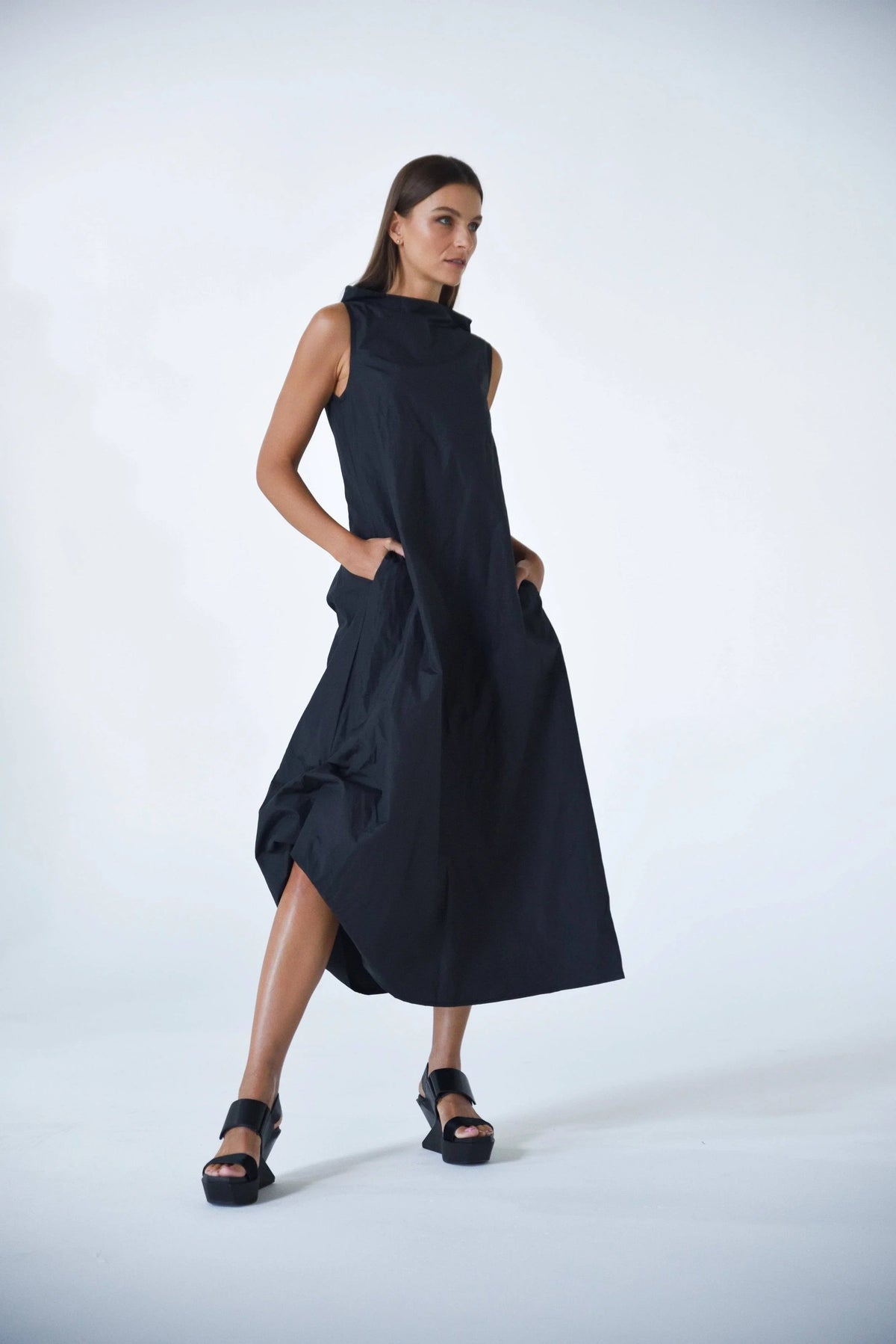 Black Imperial dress by SIMPLY MILA Modern Women's Clothing, stylish sleeveless dress with a fitted silhouette.