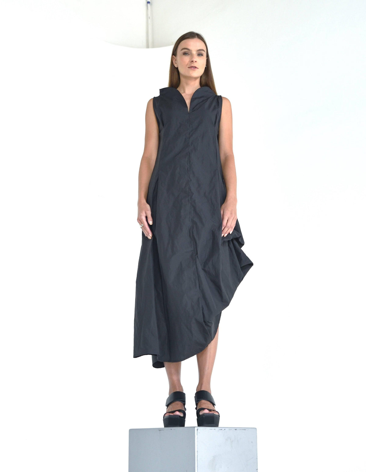 Simple black Imperial dress by SIMPLY MILA Modern Women's Clothing, featuring a fitted bodice and flowing skirt.