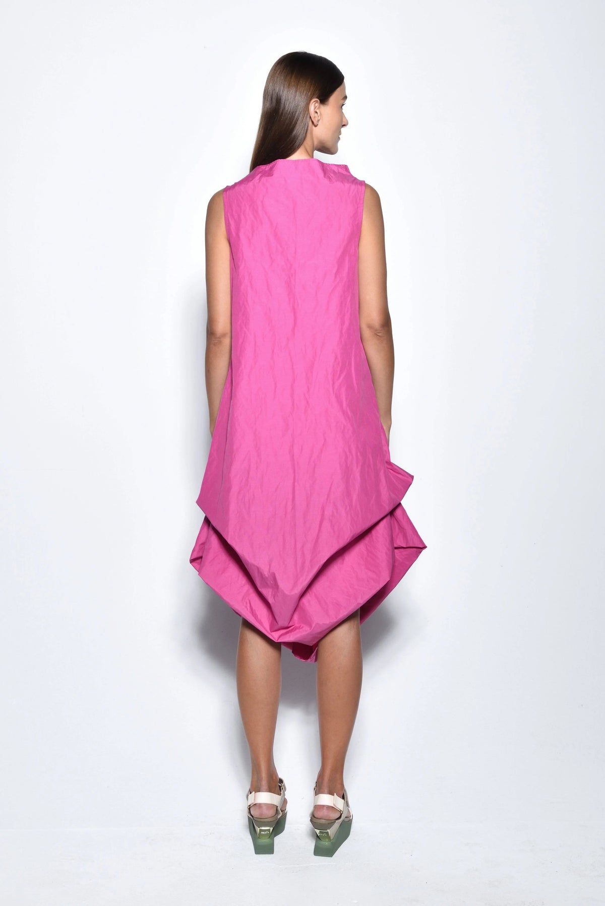 Back view of a stylish Imperial dress by SIMPLY MILA Modern Women's Clothing, showcasing elegant fabric and design details.
