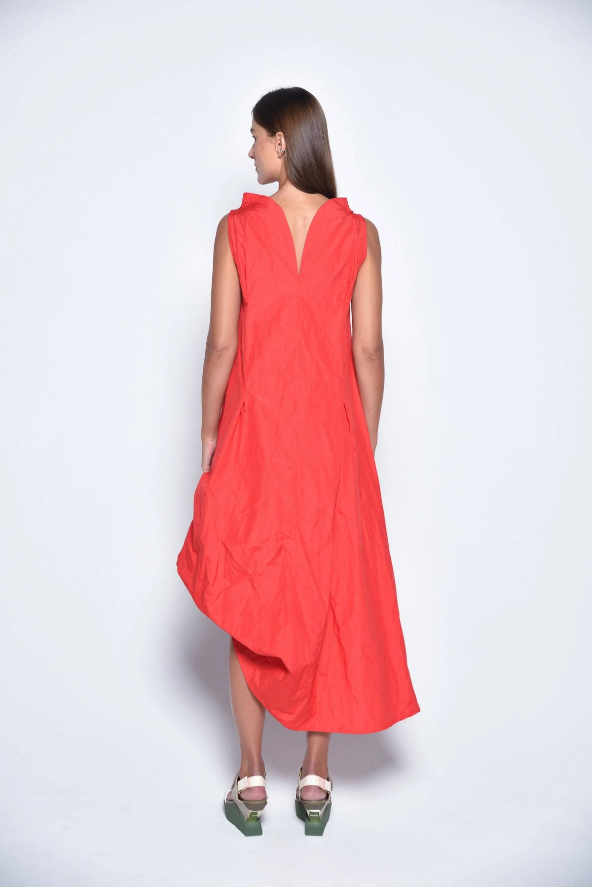 Red Imperial dress by SIMPLY MILA Modern Women's Clothing, back view showing elegant design and flowing fabric.