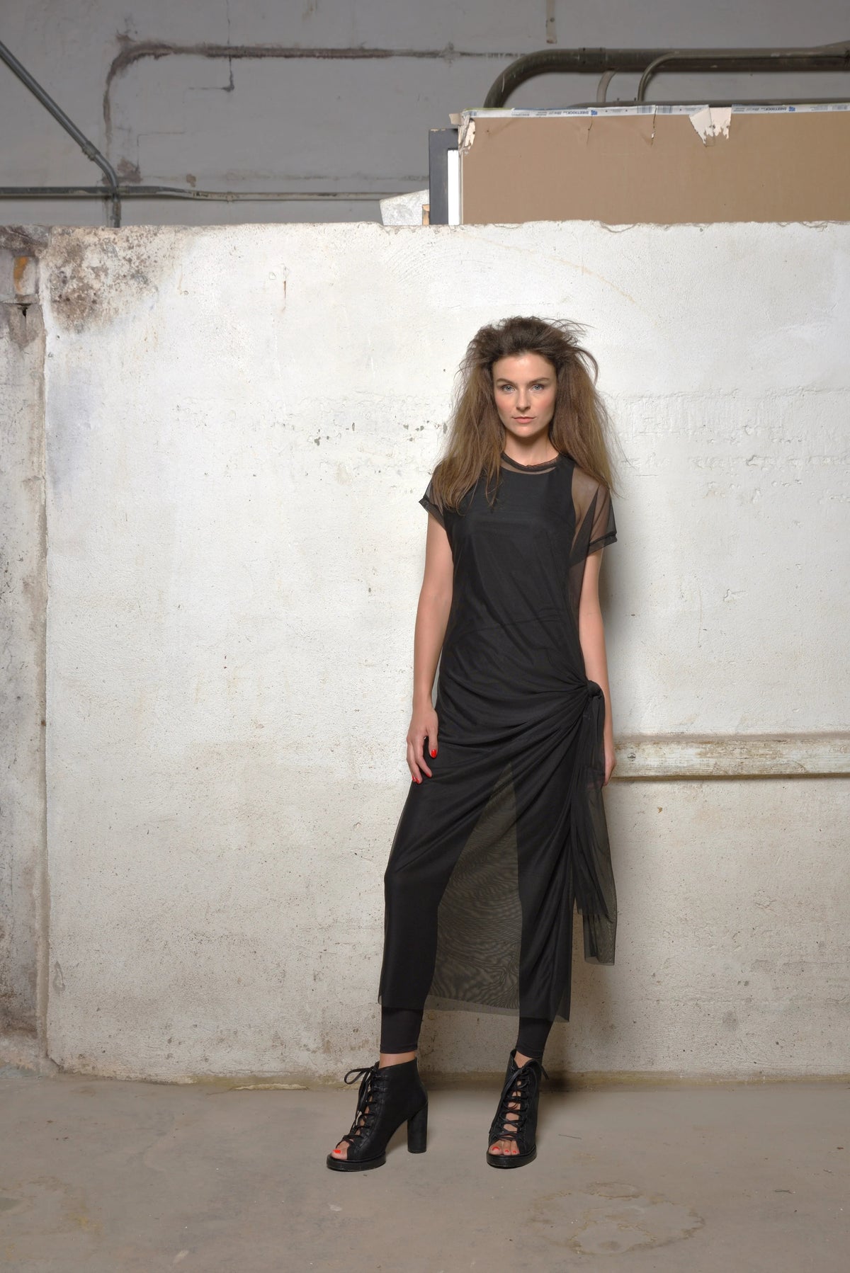 Light gray mesh dress by SIMPLY MILA Modern Women's Clothing, featuring a stylish see-through design and fitted silhouette.