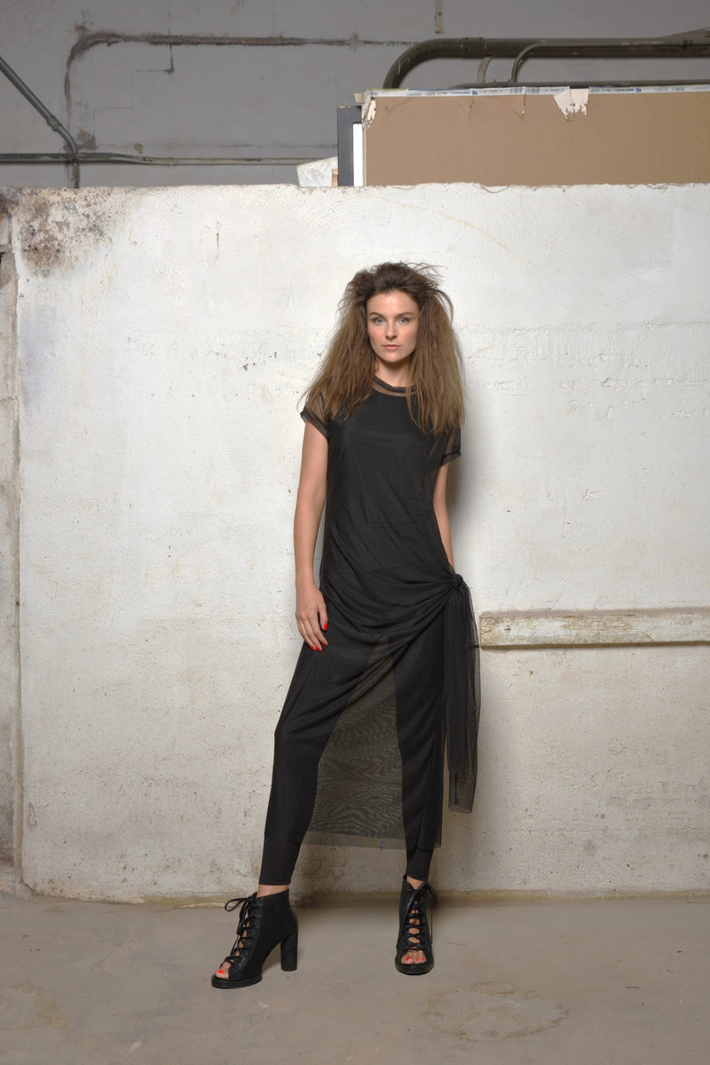 Black mesh dress from SIMPLY MILA Modern Women's Clothing, featuring sheer fabric and stylish design for women.