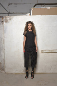 Front view of a stylish mesh dress by SIMPLY MILA, featuring a modern design perfect for women's fashion.