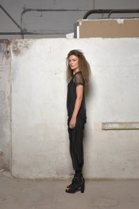 Side view of a stylish mesh dress by SIMPLY MILA, featuring a modern women's clothing design with breathable, lightweight fabric.