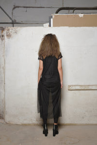 Black mesh dress from SIMPLY MILA Modern Women's Clothing, featuring a stylish, semi-sheer design perfect for modern fashion.