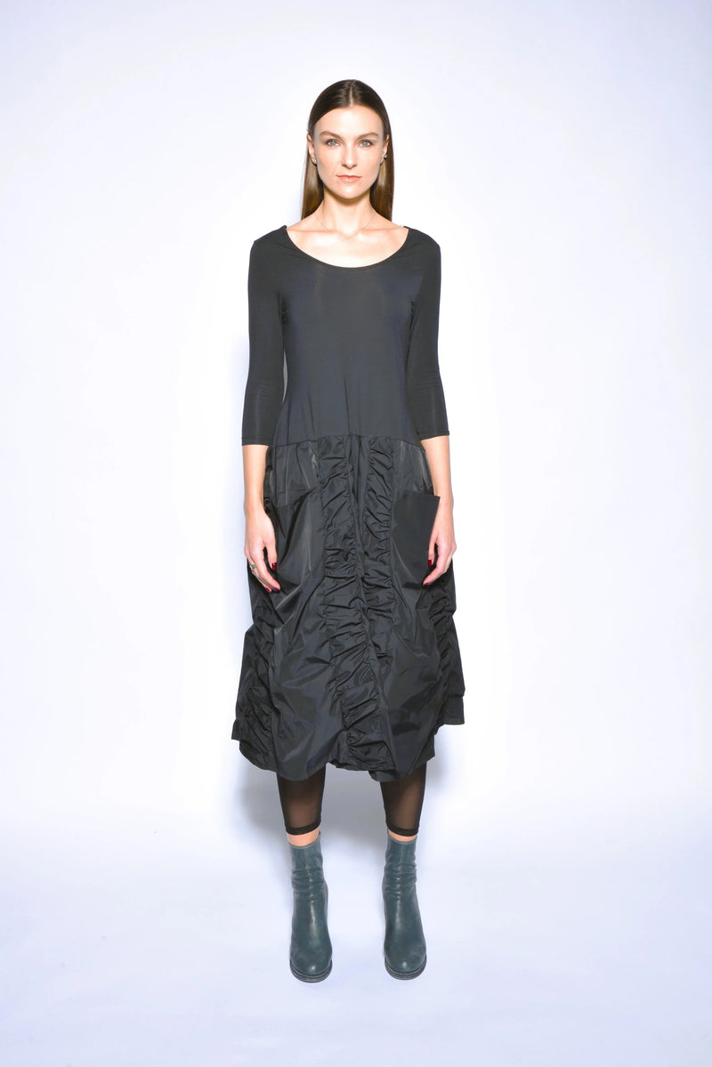 Ophelia dress from SIMPLY MILA Modern Women's Clothing, featuring a stylish, elegant dress with a flowing fabric and trendy design.