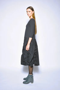 Ophelia dress by SIMPLY MILA Modern Women's Clothing, featuring a stylish, flowy dress with a feminine silhouette and vibrant pattern.