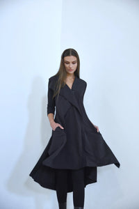 Flowy Sasha Dress from SIMPLY MILA Modern Women's Clothing, showcasing the elegant design and soft fabric.