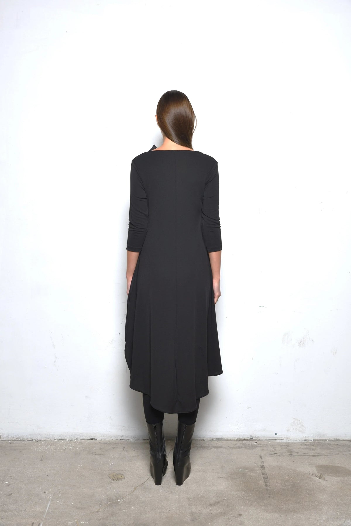 Back view of the Sasha Dress by SIMPLY MILA, a stylish modern women's dress with a fitted silhouette and elegant design.