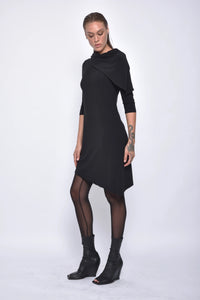Elegant Selene dress by SIMPLY MILA Modern Women's Clothing, featuring a flowing design and stylish details.