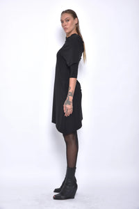 Side view of the Selene dress by SIMPLY MILA Modern Women's Clothing, showcasing its elegant design and fabric details.