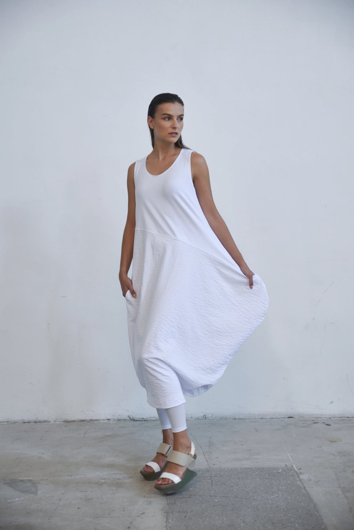 Sleeveless Babylon dress by SIMPLY MILA, stylish women's dress with a modern design, shown in a close-up view.